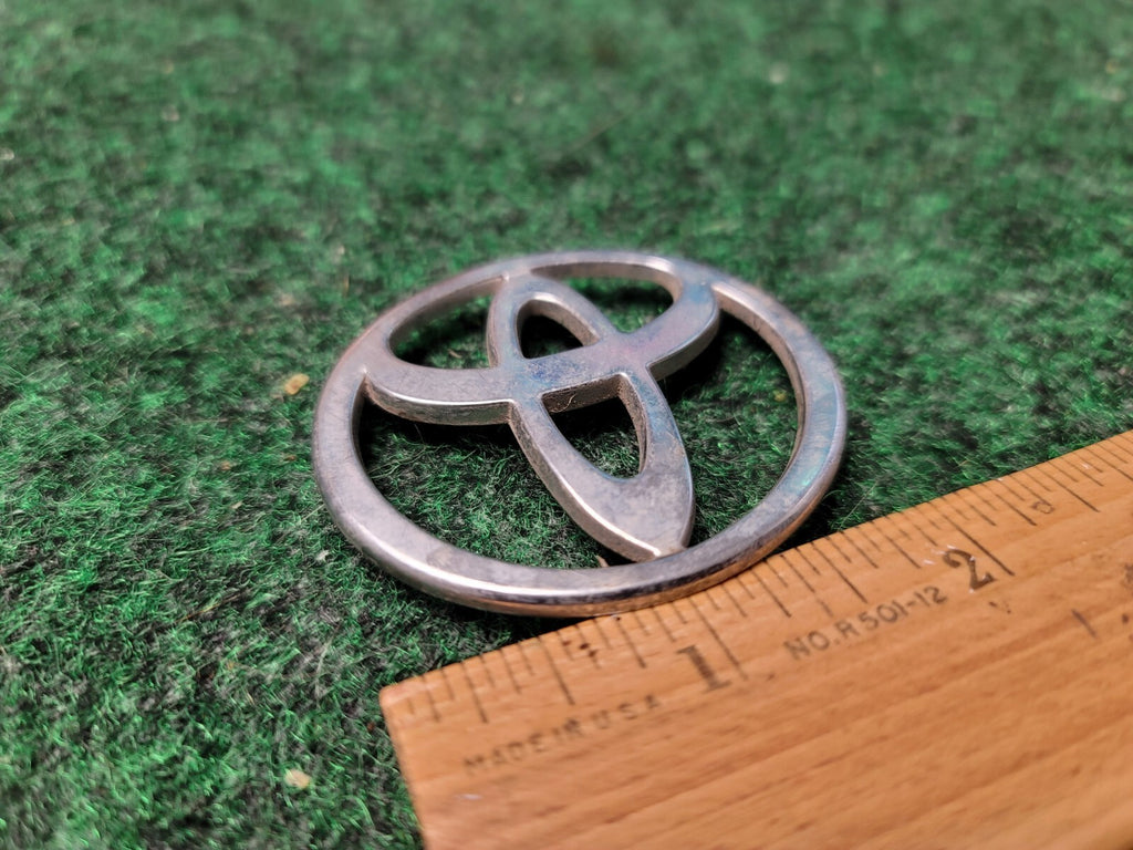 Toyota Chrome Plastic Emblem Badge Logo OEM 2" wide 10L3