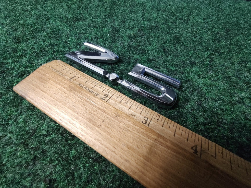NISSAN 2.5 REAR CHROME EMBLEM LOGO SYMBOL BADGE OEM 5S4