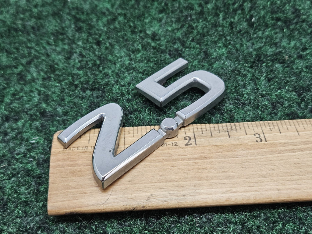 NISSAN 2.5 REAR CHROME EMBLEM LOGO SYMBOL BADGE OEM 7S8