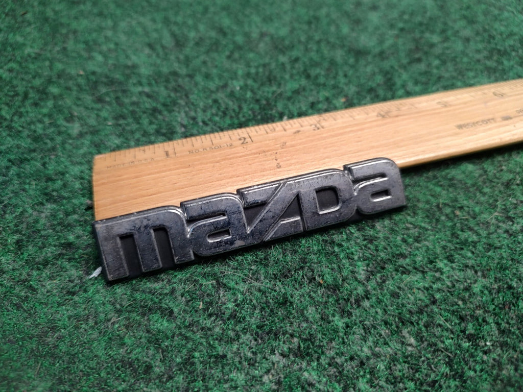Mazda 1995-1998 Protege Rear Trunk Emblem Badge Logo Nameplate BC5A 51 710 3S3