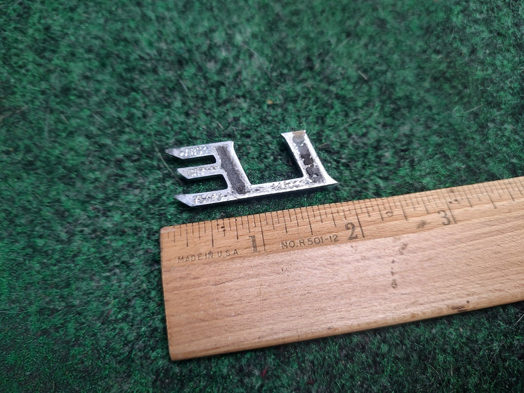 Genuine Toyota Camry "LE" Emblem USED 2002-2006  Rear 75443-AA100 3S5