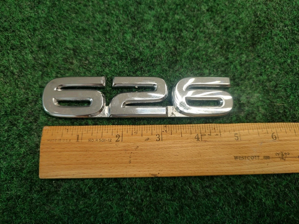00 01 02 MAZDA 626 REAR LID EMBLEM LOGO BADGE SIGN SYMBOL OEM Name Plate 2S8