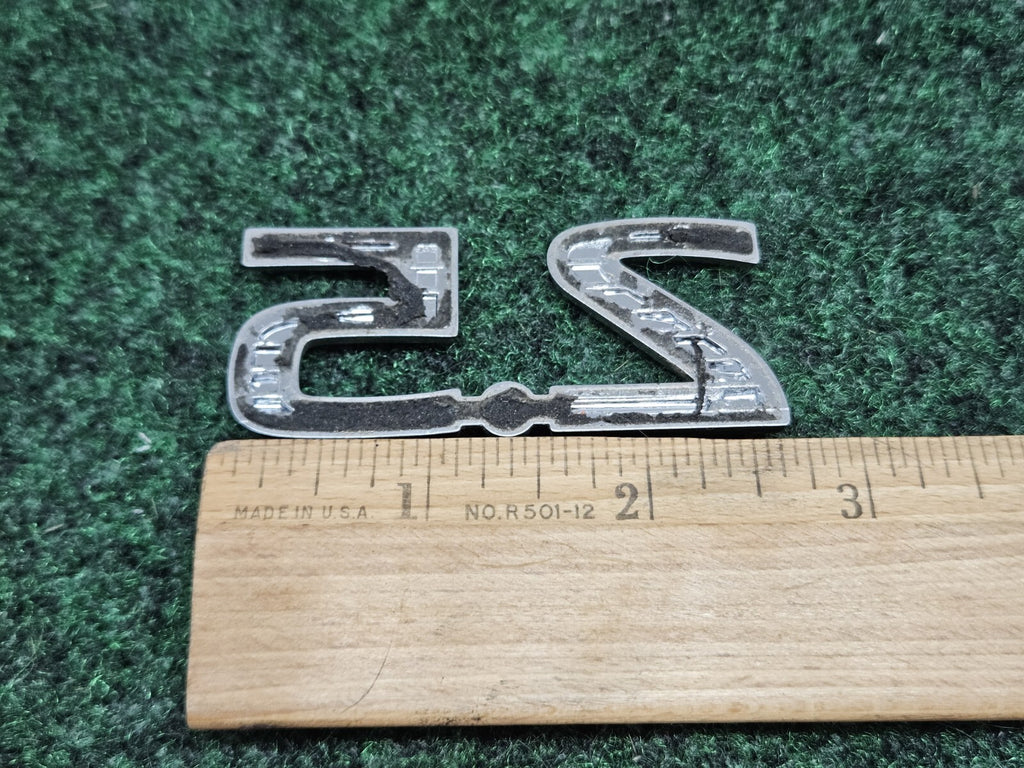 NISSAN 2.5 REAR CHROME EMBLEM LOGO SYMBOL BADGE OEM 7S8