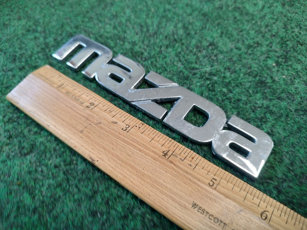 2000-2002 MAZDA 626 TRUNK LID EMBLEM Name Plate Nameplate GG2A-51711 2S8