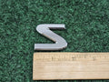 04-15 NISSAN ARMADA "S" REAR TRUNK TAIL GATE CHROME EMBLEM LOGO 93494-8S100 7S9