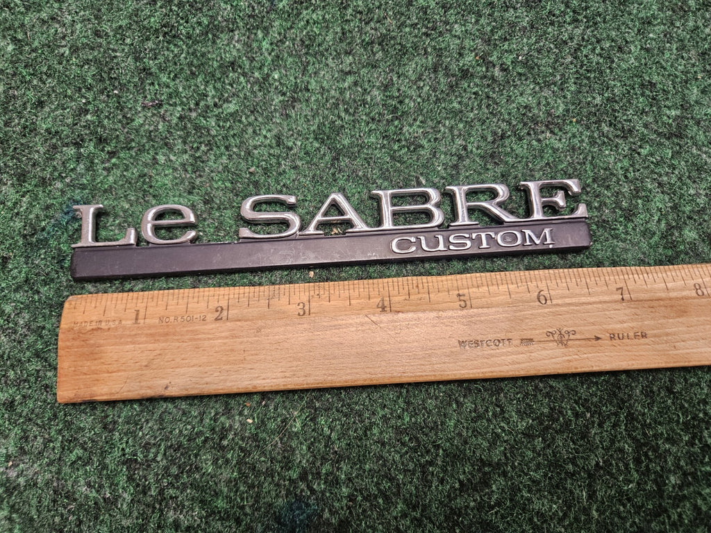 BUICK LESABRE CUSTOM - OEM EMBLEM BADGE SYMBOL LOGO NAME PLATE 6M9