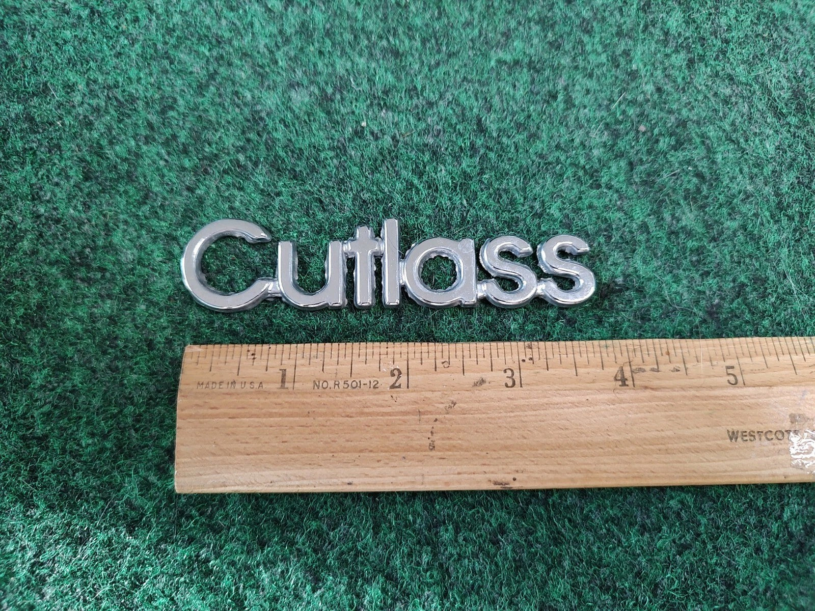 Oldsmobile Cutlass Emblem Nameplate Chrome Metal OEM 1S1