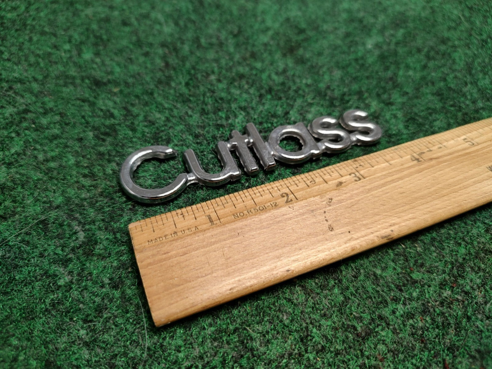 Oldsmobile Cutlass Emblem Nameplate Chrome Metal OEM 1S2
