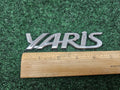 2006-2011 TOYOTA YARIS REAR EMBLEM LOGO BADGE SYMBOL CHROME LETTERS OEM GL1