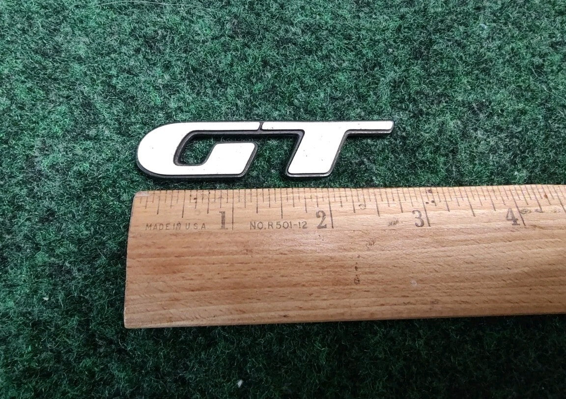 PONTIAC GRAND AM PRIX GT EMBLEM LOGO BADGE SIGN SYMBOL USED White OEM 5S5
