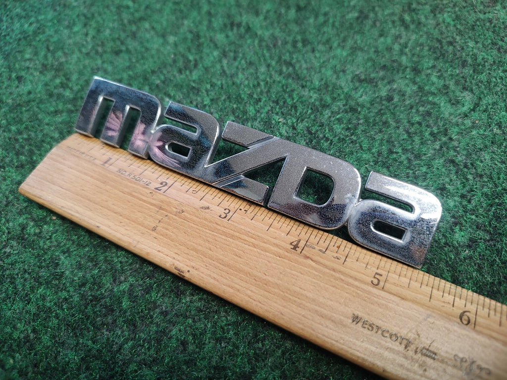 1999 00 2001 2002 2003 Mazda Protege Rear Trunk Nameplate Emblem B25D-51-710 1S9