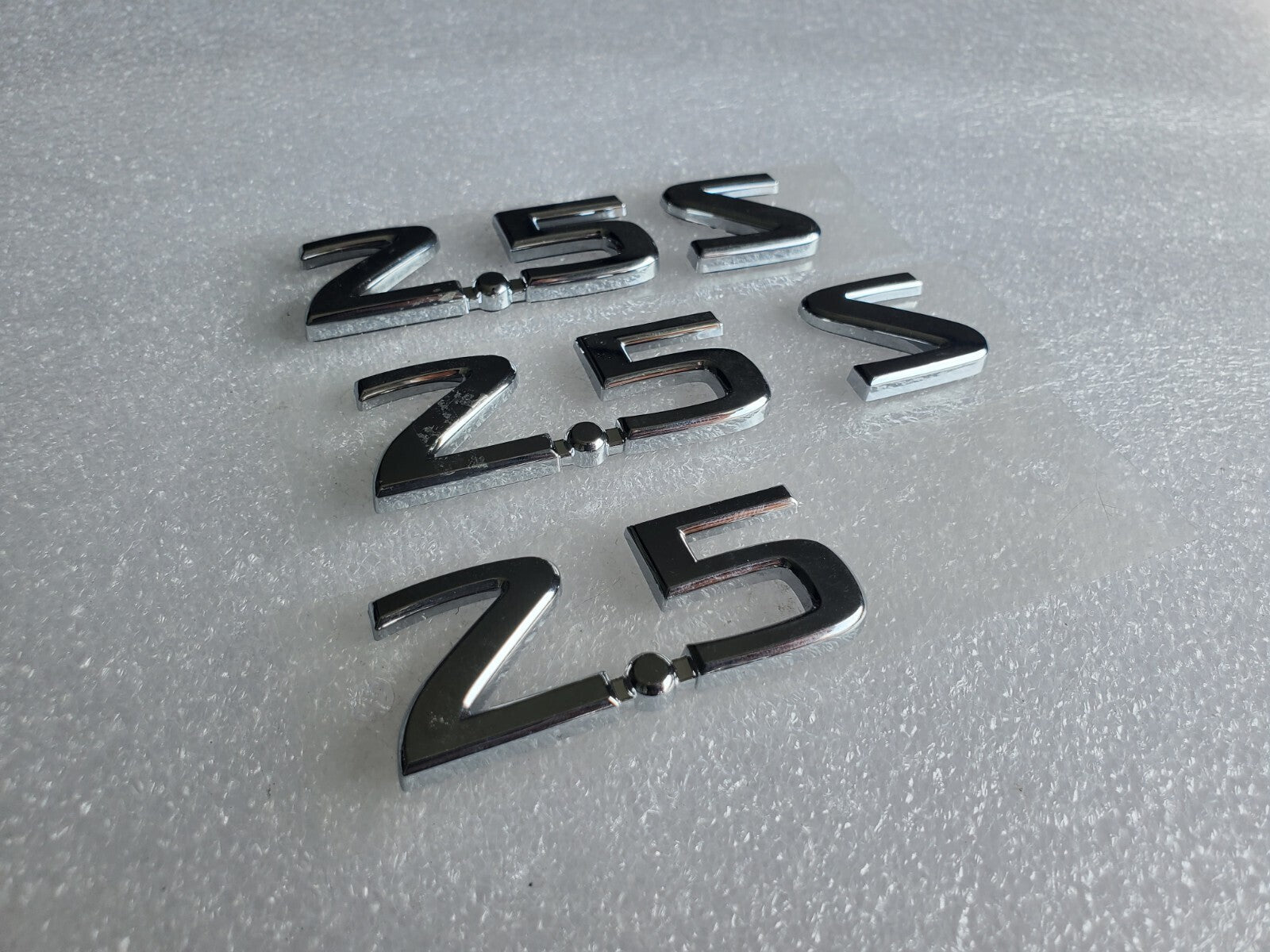 NISSAN 2.5 S REAR CHROME EMBLEM LOGO SYMBOL BADGE OEM 2L4