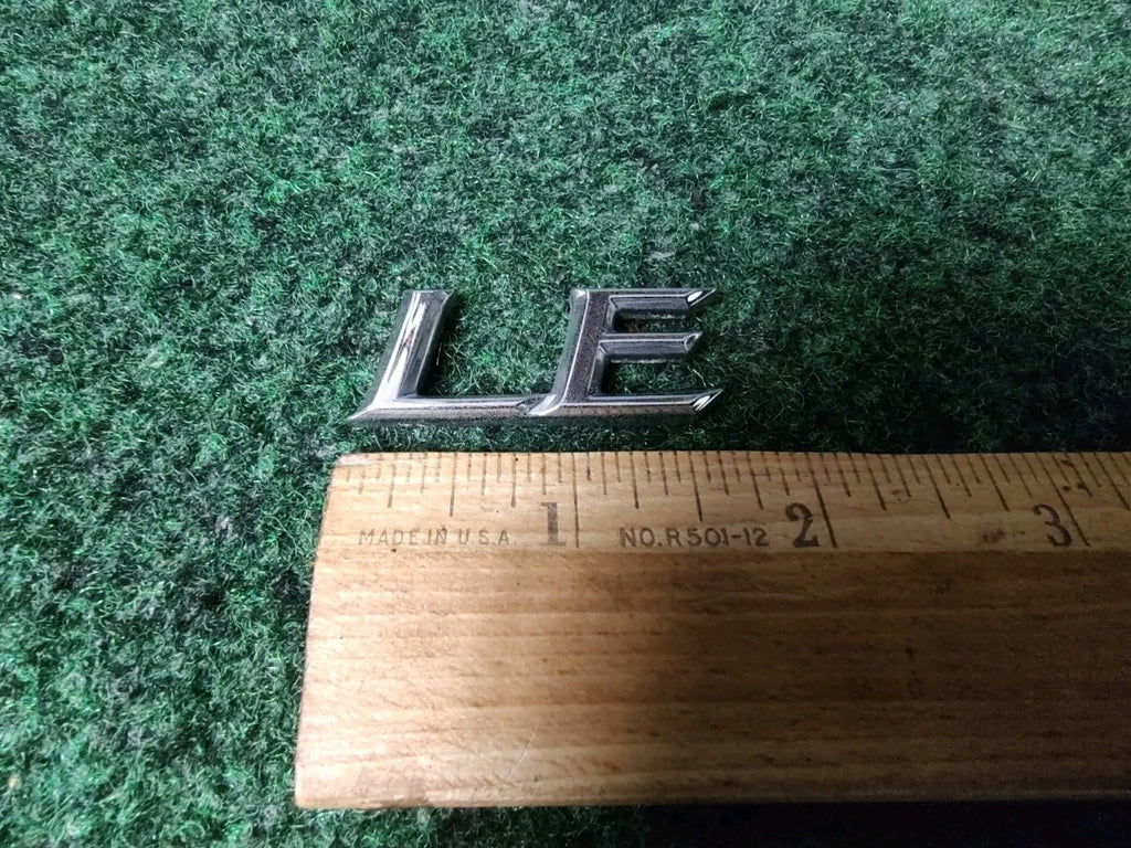 Genuine Toyota Camry "LE" Emblem USED 2002-2006  Rear 75443-AA100 5S4