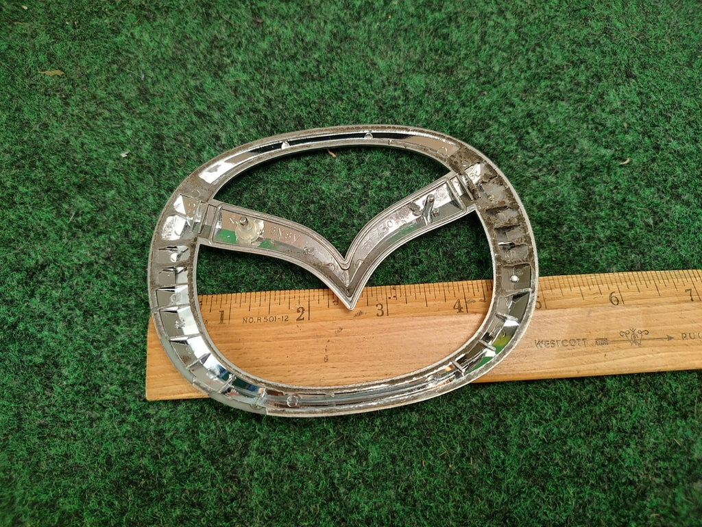 04 05 06 07 08 09 MAZDA 3  EMBLEM LOGO BADGE OEM BN8V-51-730 2S6