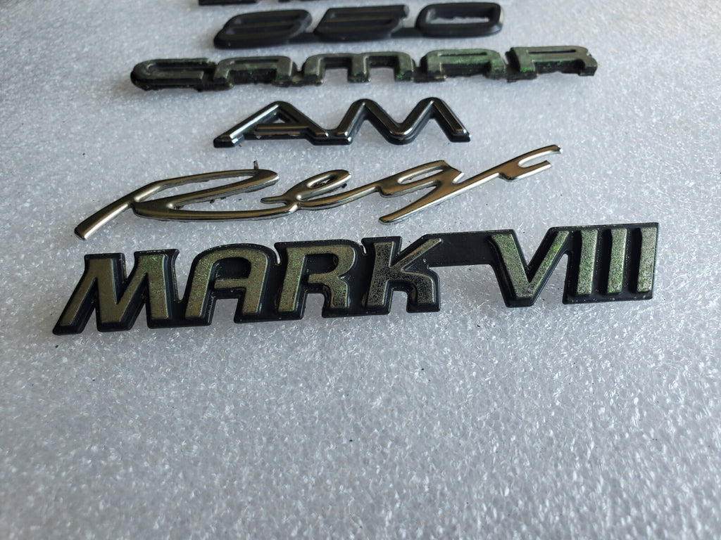 Misc Lot Of Emblwms Vintage Letters Logo OEM Mark VIII VOLVO Regal Camaro VNTG