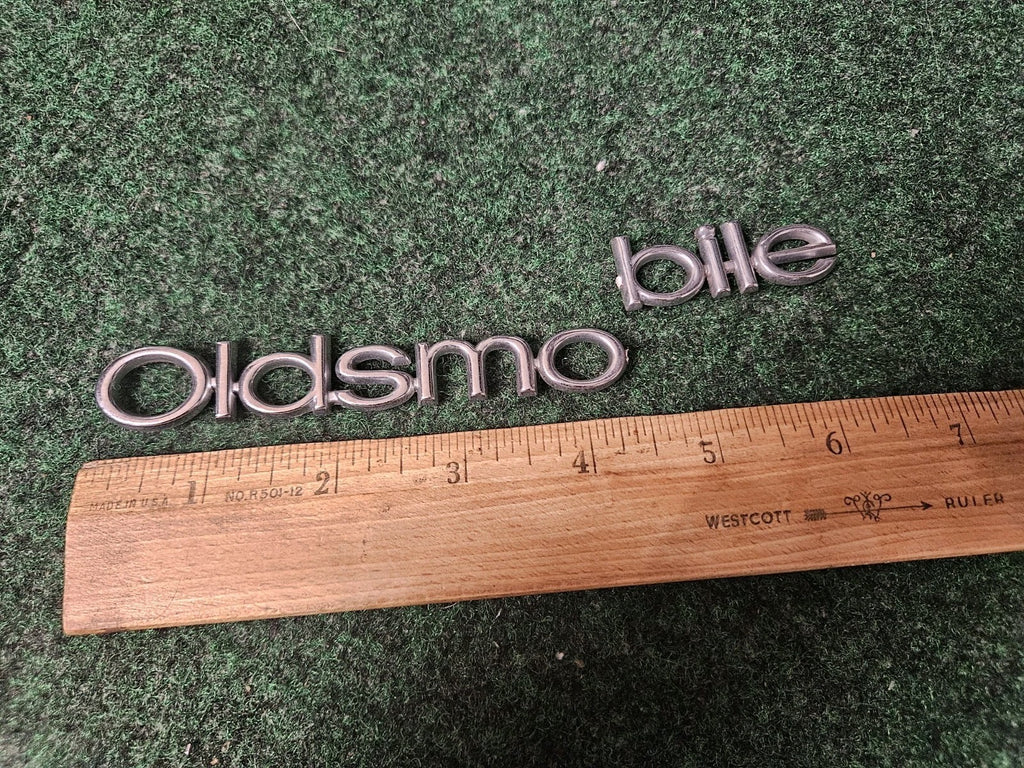 Oldsmobile OEM Chrome Emblem Badge Logo Nameplate Name Plate 6.25" Cracked 3M5