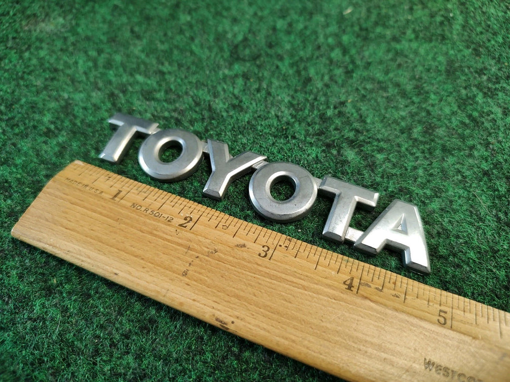 2003-2008 Toyota Matrix Liftgate Emblem Logo OEM 75441-02070 Trunk Rear Oem 3M1