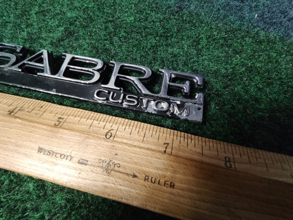 BUICK LESABRE CUSTOM - OEM EMBLEM BADGE SYMBOL LOGO NAME PLATE 6S6