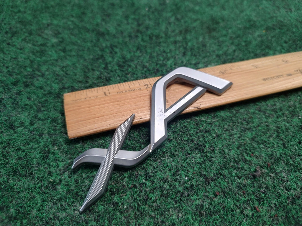 2004-2006 Scion xA Emblem Logo Badge Symbol Rear Tailgate Trunk Silver Gray 3S7
