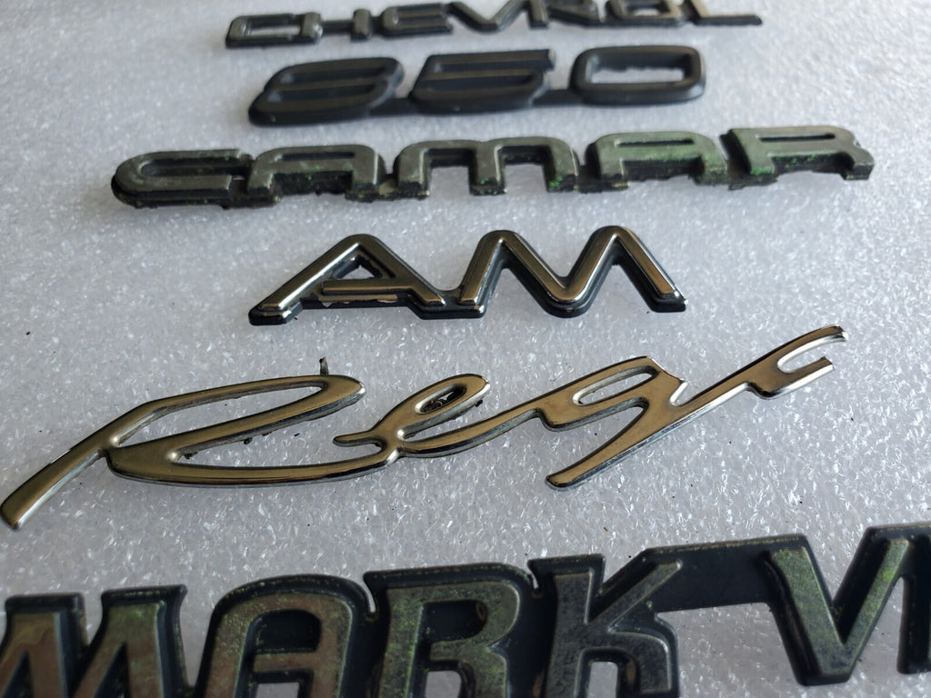 Misc Lot Of Emblwms Vintage Letters Logo OEM Mark VIII VOLVO Regal Camaro VNTG
