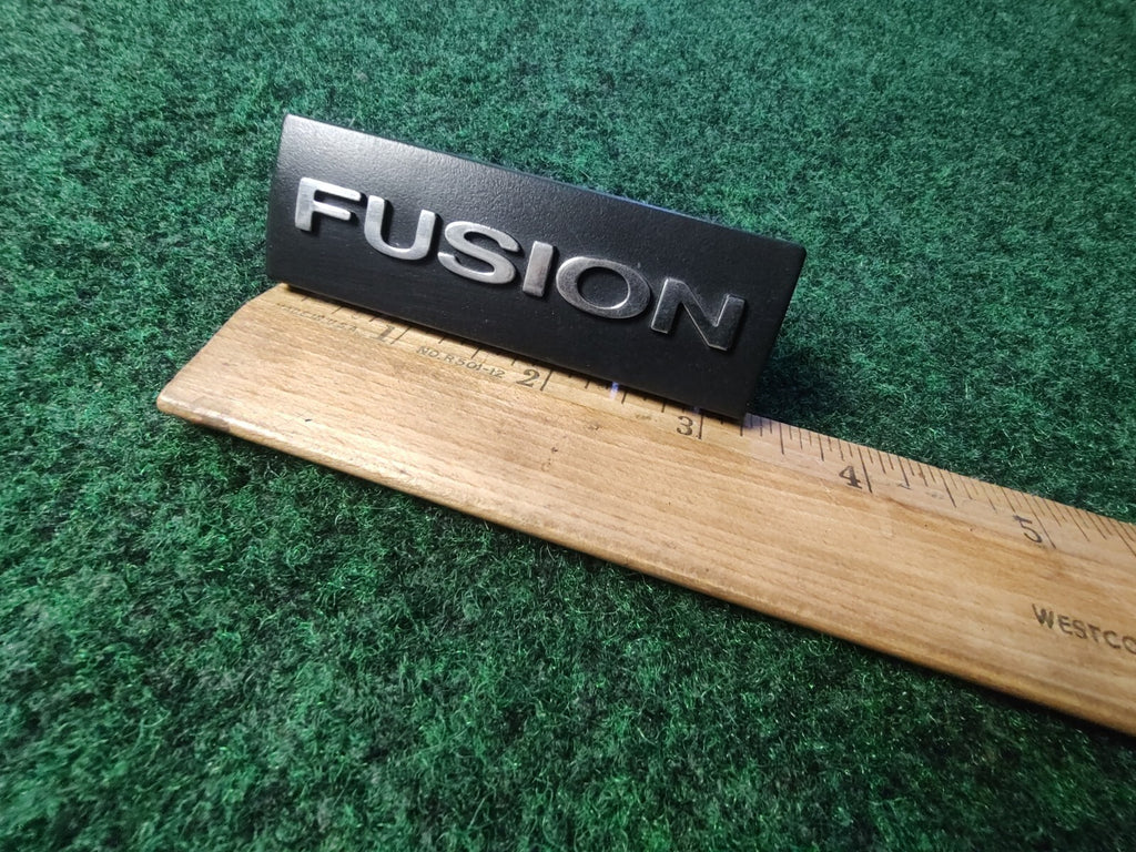 2006-2009 FORD FUSION DASH EMBLEM LOGO BADGE SYMBOL USED OEM 8L2
