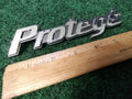 Mazda Protege trunk emblem badge decal logo symbol OEM Factory Genuine 3S1