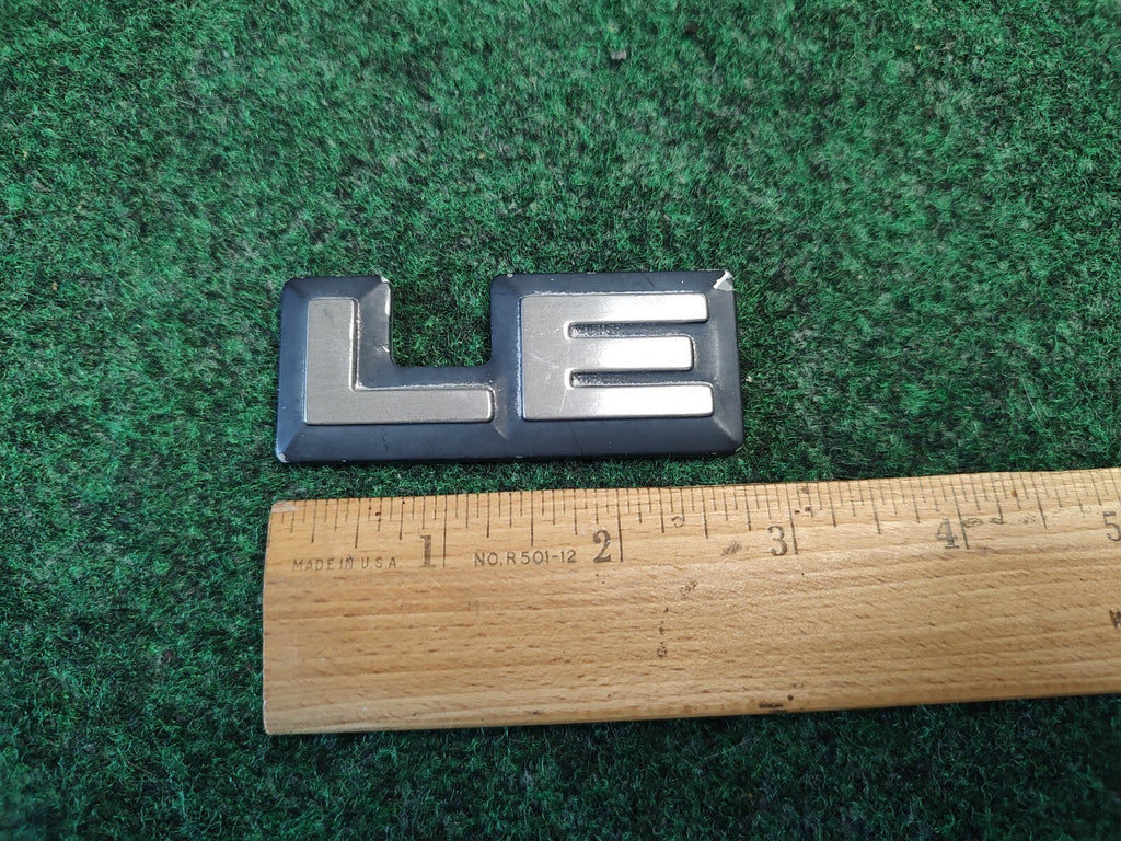1987-1996 Dodge Dakota LE Cab Corner Emblem Name Plate Badge  55026887 5S1