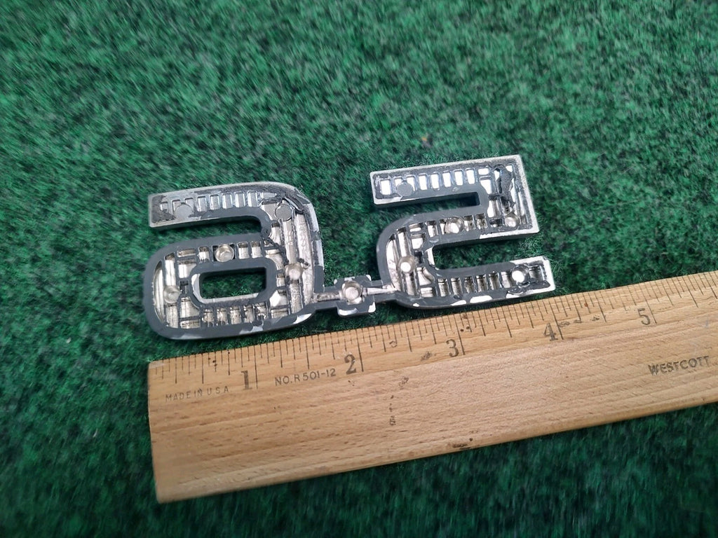Nissan 5.6 emblem badge decal logo symbol Titan Armada OEM Factory Genuine 2S8