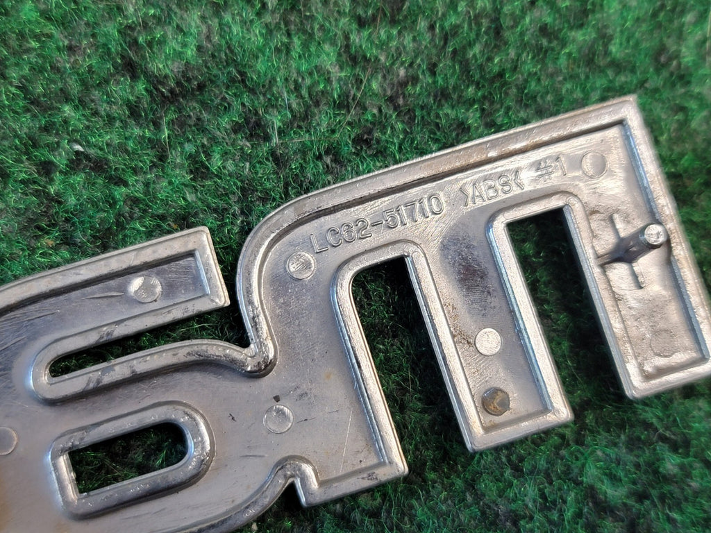2000-2006 Mazda MPV Rear Emblem Name Plate LC62-51710 7L1