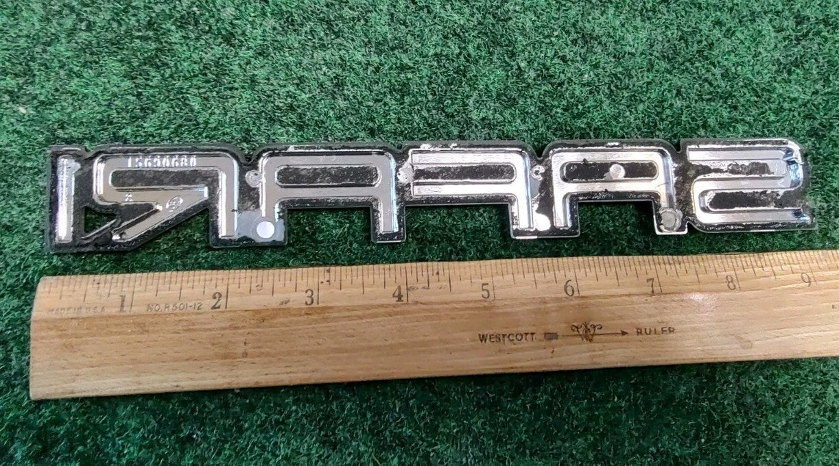 1995-2005 GMC Safari Front Door Nameplate Badge Emblem 15690680 OEM 8L4