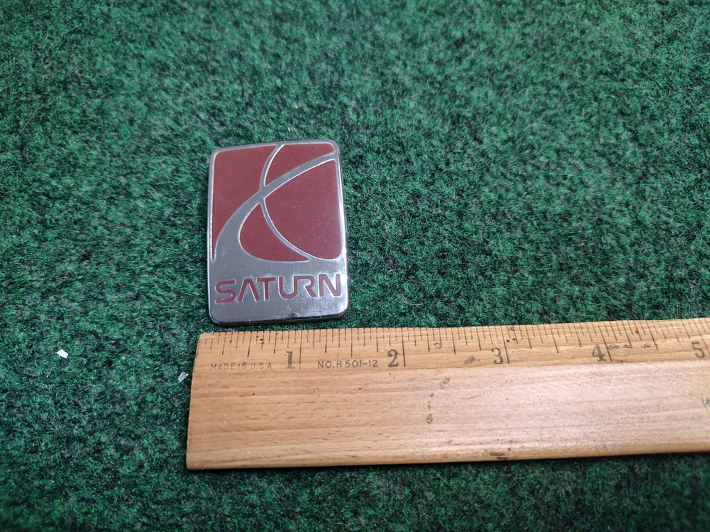 1991-1999 Saturn SL SL1 SL2 Front Bumper Emblem Badge Logo OEM 21111139 3S1