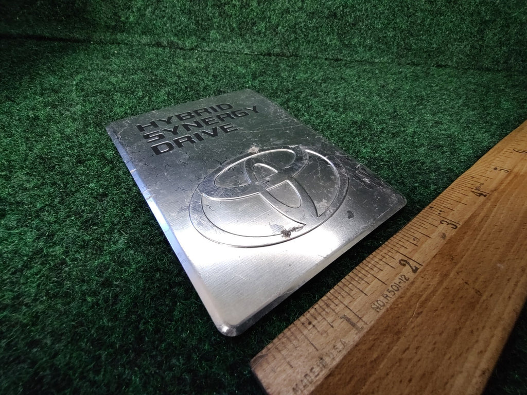 2004-2009 TOYOTA PRIUS HYBRID SYNERGY DRIVE DC CONVERTER EMBLEM BADGE OEM 5S6