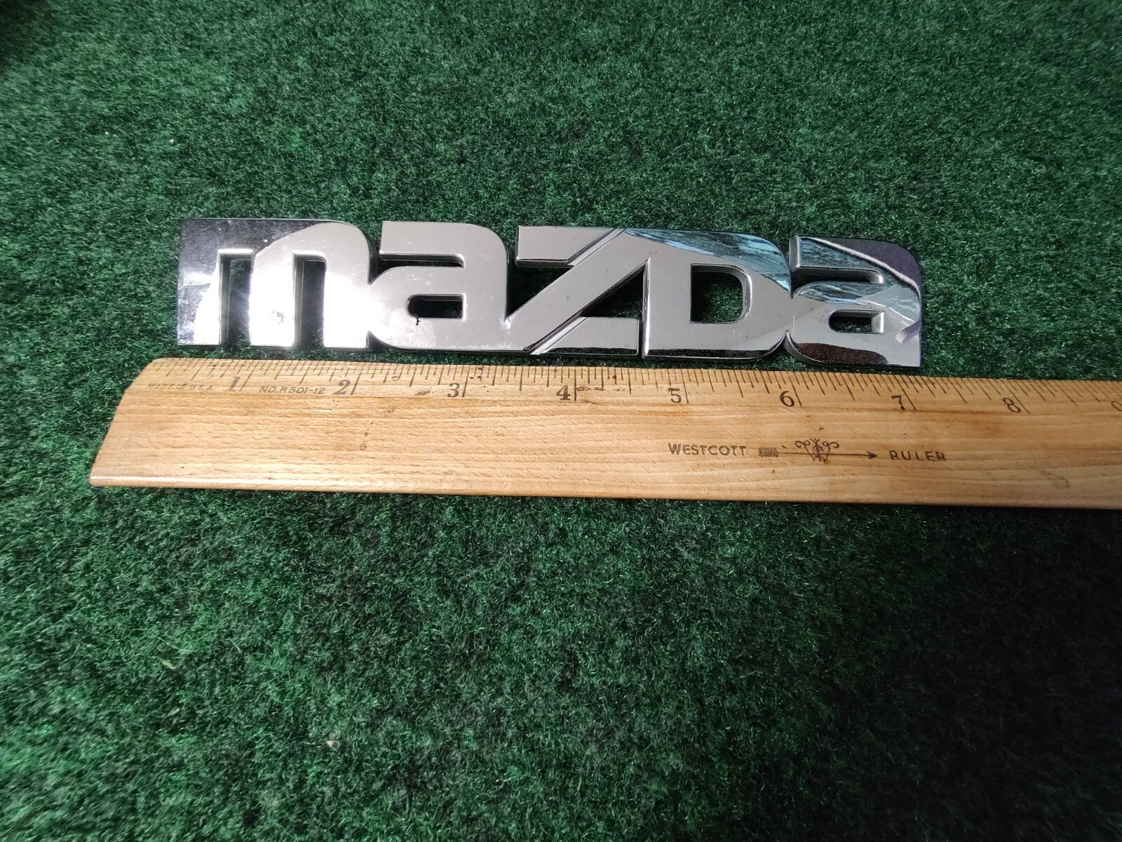 2000-2006 Mazda MPV Rear Emblem Name Plate LC62-51710 3M1