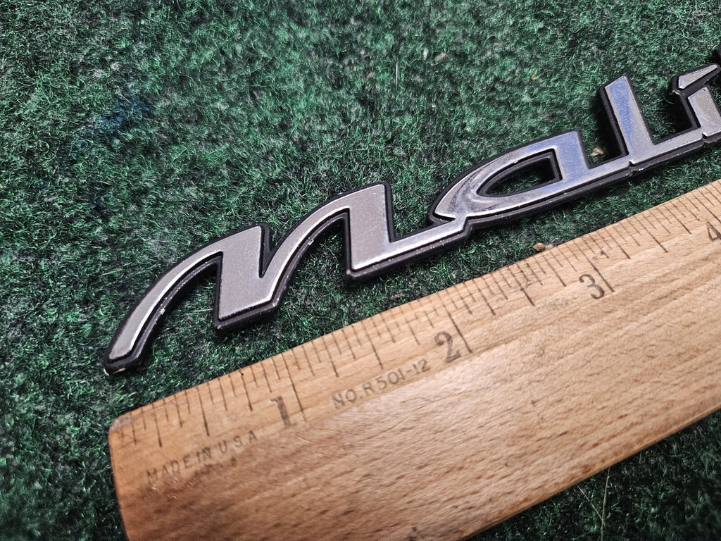 1997-2003 Chevy Malibu Chrome Rear Emblem Badge Logo Nameplate Name Plate 6M9