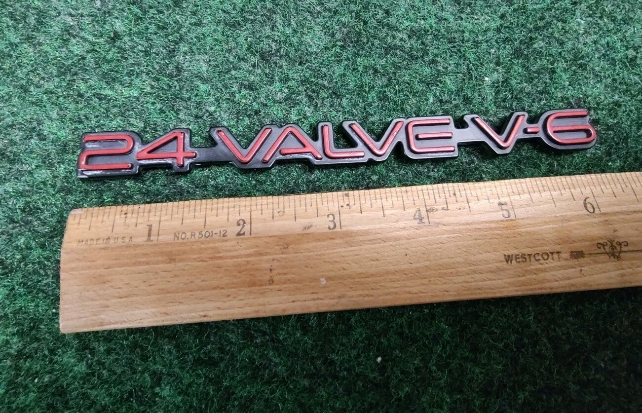 PONTIAC GRAND PRIX 24 VALVE V-6 CIRCA '92 FRONT FENDER EMBLEM 10141749 Red 5S5