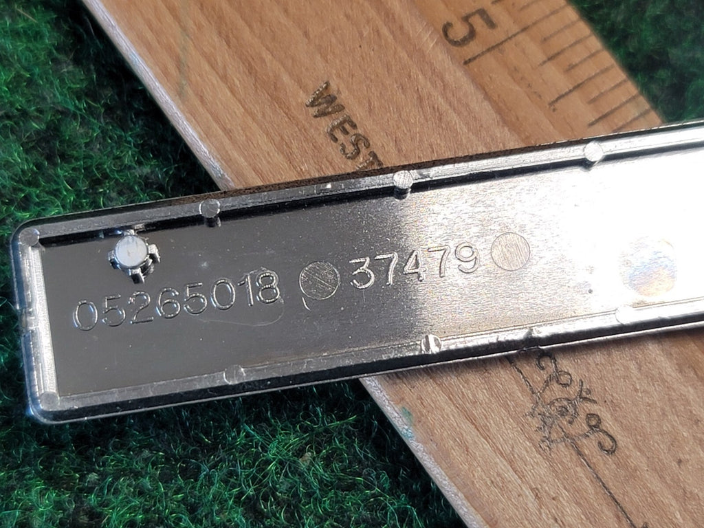Mopar Interior Name Plate - "DODGE CARAVAN" - 1980's Emblem Badge Logo 1M6