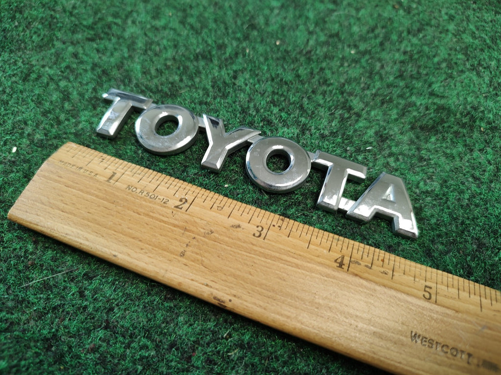 2003-2008 Toyota Matrix Liftgate Emblem Logo OEM 75441-02070 Trunk Rear 1S4
