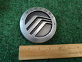 2005 2006 2007 MERCURY MONTEGO REAR GATE LID CENTER EMBLEM LOGO BADGE SIGN 4S7