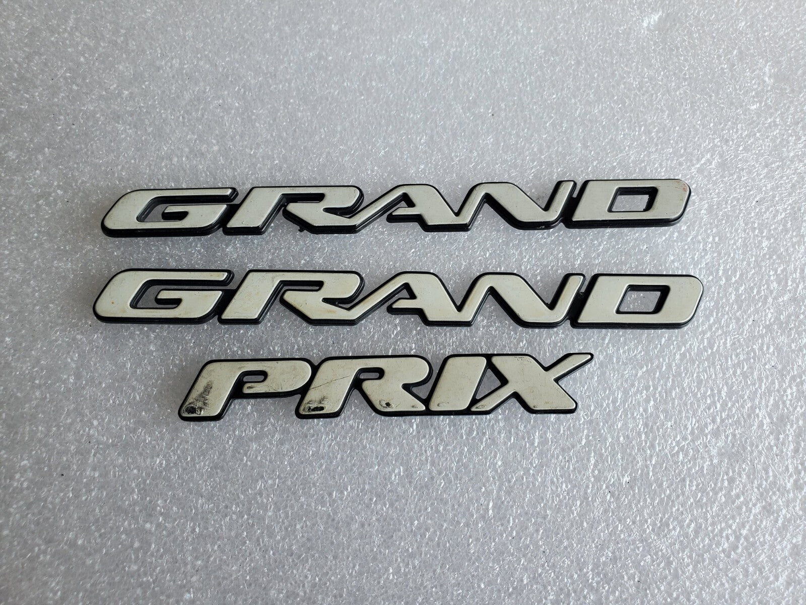 1997 2003 Pontiac Grand Prix Door Name Plate White NAMEPLATE OEM VNTG