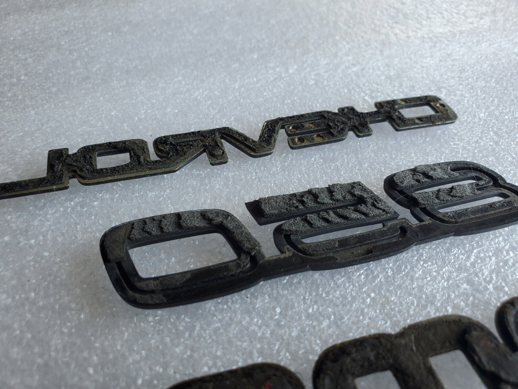 Misc Lot Of Emblwms Vintage Letters Logo OEM Mark VIII VOLVO Regal Camaro VNTG