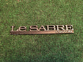 BUICK LESABRE CUSTOM - OEM EMBLEM BADGE SYMBOL LOGO NAME PLATE 9L6