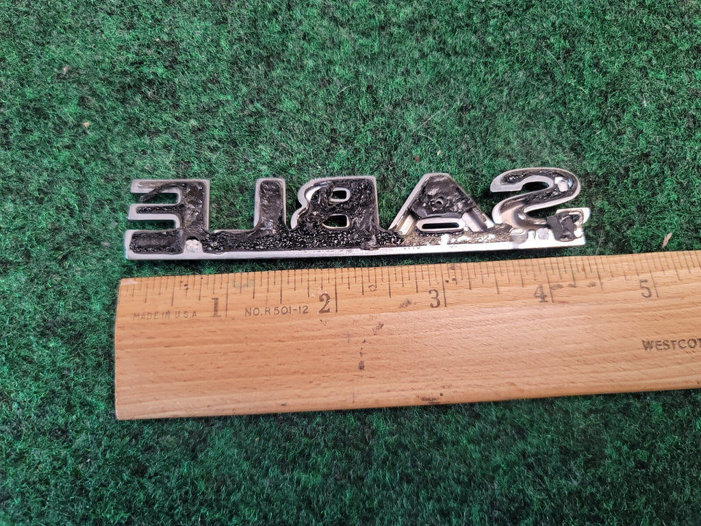 00 01 02 03 MERCURY SABLE REAR GATE LID EMBLEM BADGE SYMBOL LOGO OEM 2M4