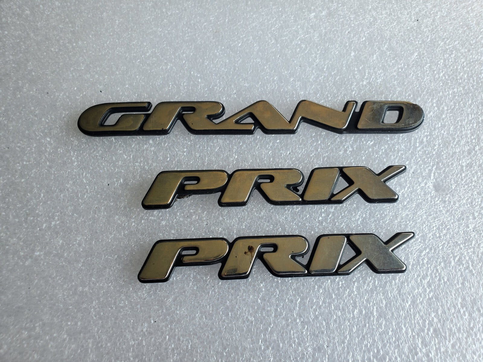 1997 1998 1999 2003 Pontiac Grand Prix Door Name Plate Chrome NAMEPLATE OEM VNTG