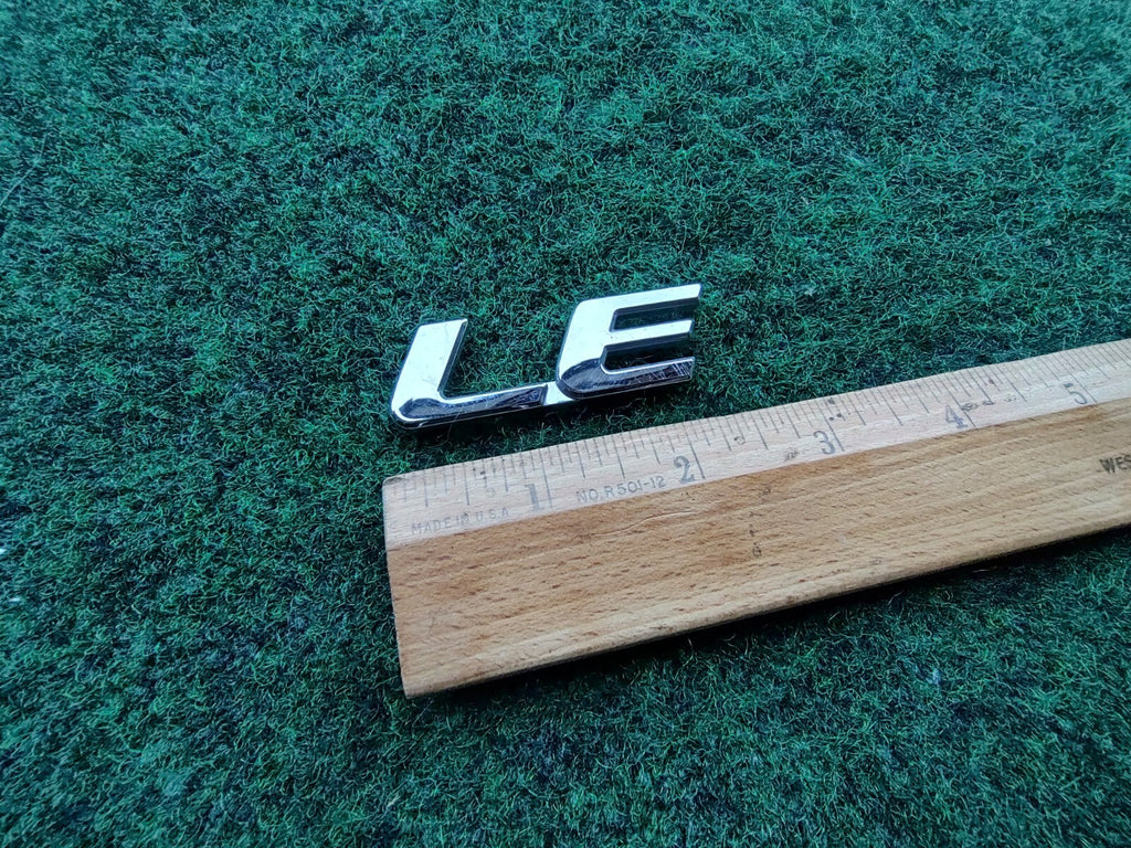 1998-2018 Toyota OEM Sienna LE Rear Emblem Badge Logo Nameplate 75443-08020 5S3