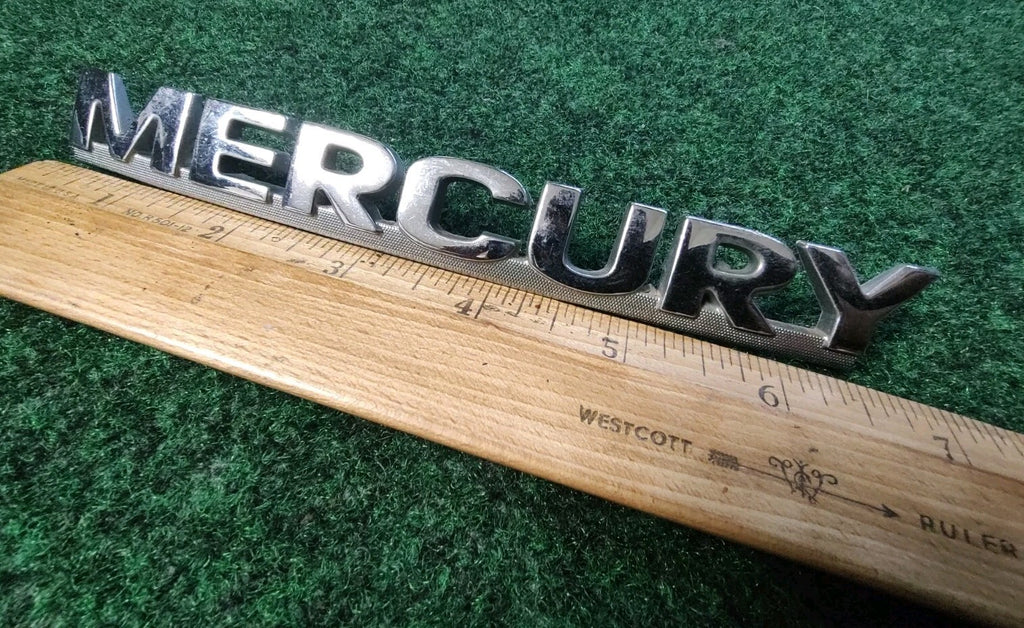 MERCURY REAR GATE LID EMBLEM BADGE SYMBOL LOGO OEM 6S1