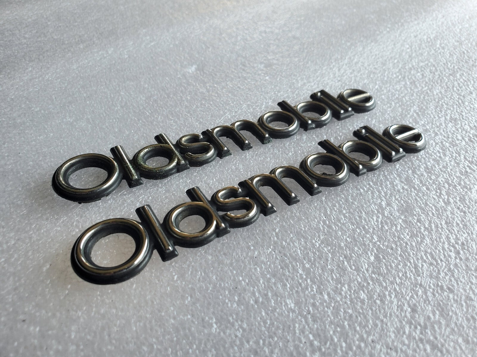 (2) Oldsmobile OEM Chrome Black 5.1" Emblem Badge Logo Nameplate Name Plate VNTG