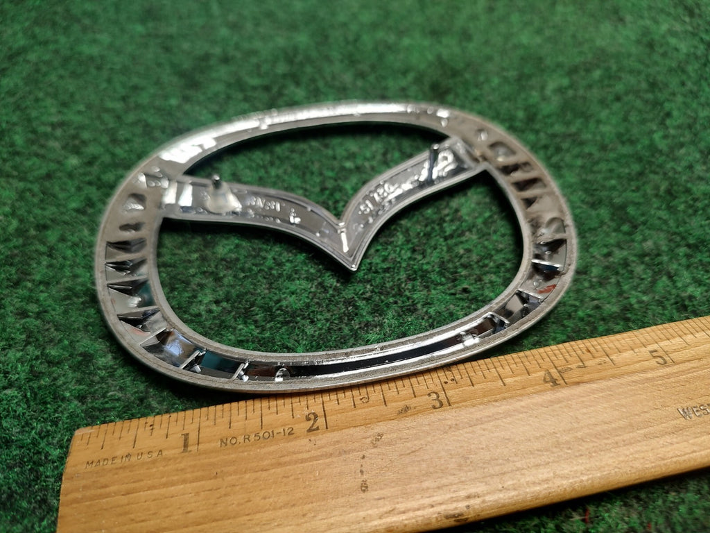 2004-2009 MAZDA 3 4DR SEDAN REAR TRUNK EMBLEM GENUINE NEW OEM BN8V-51-730A 1S1