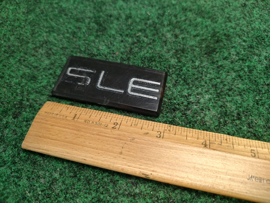 GMC SIERRA CHEVY SILVERADO TRUCK SLE EMBLEM LOGO BADGE SIGN SYMBOL USED 3S8