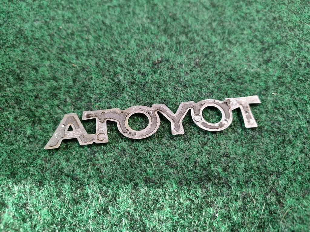 Toyota OEM Chrome Plastic Emblem Badge Logo Nameplate Name Plate Insignia 1S1