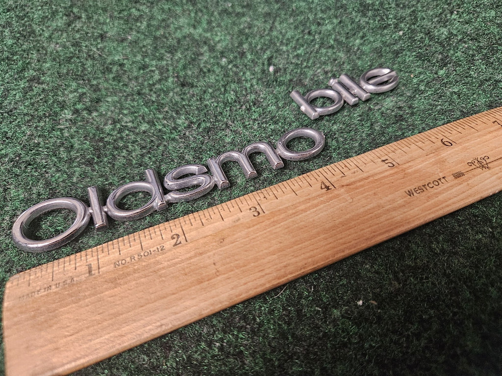 Oldsmobile OEM Chrome Emblem Badge Logo Nameplate Name Plate 6.25" Cracked 3M5